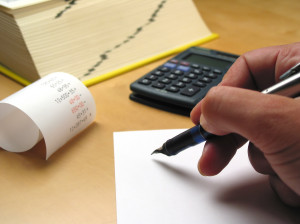 pen and calculator and paper