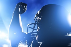 American football player celebrating score and victory.