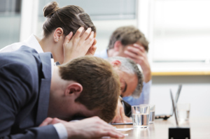 Bored employees during a meeting