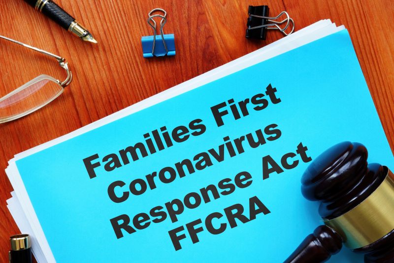 A gavel with a piece of paper reading Families First Coronavirus Response Act.
